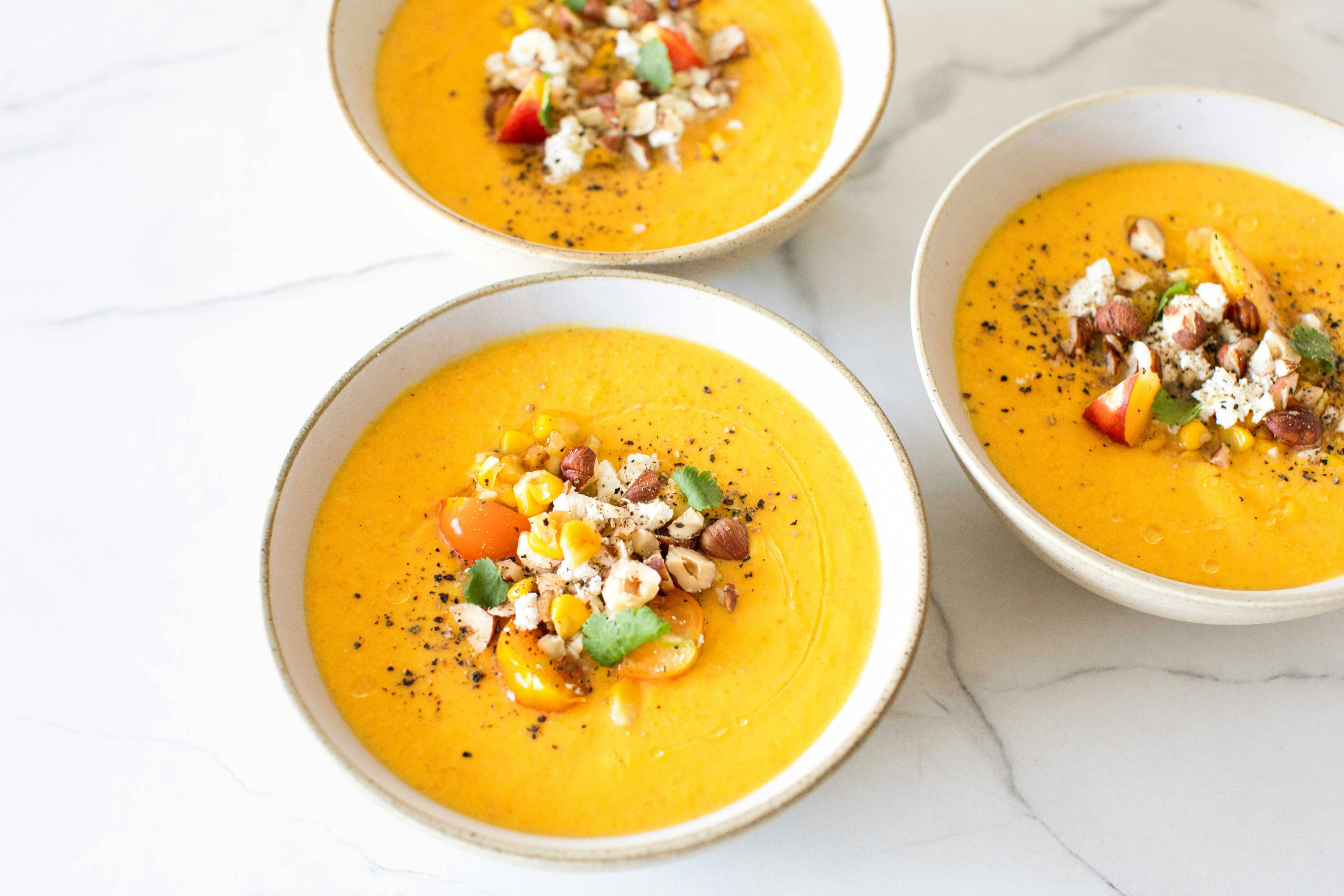 a group of bowls with food in it