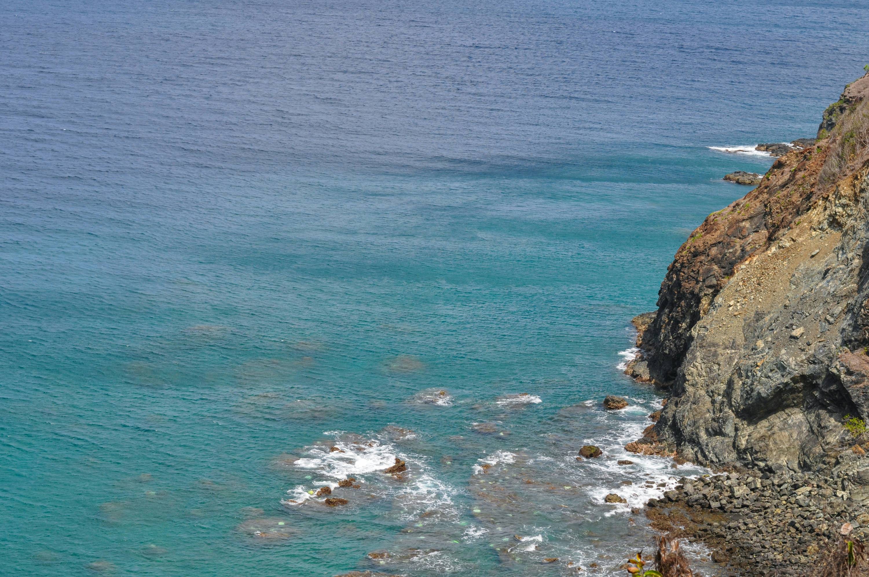 a view of the ocean from a cliff